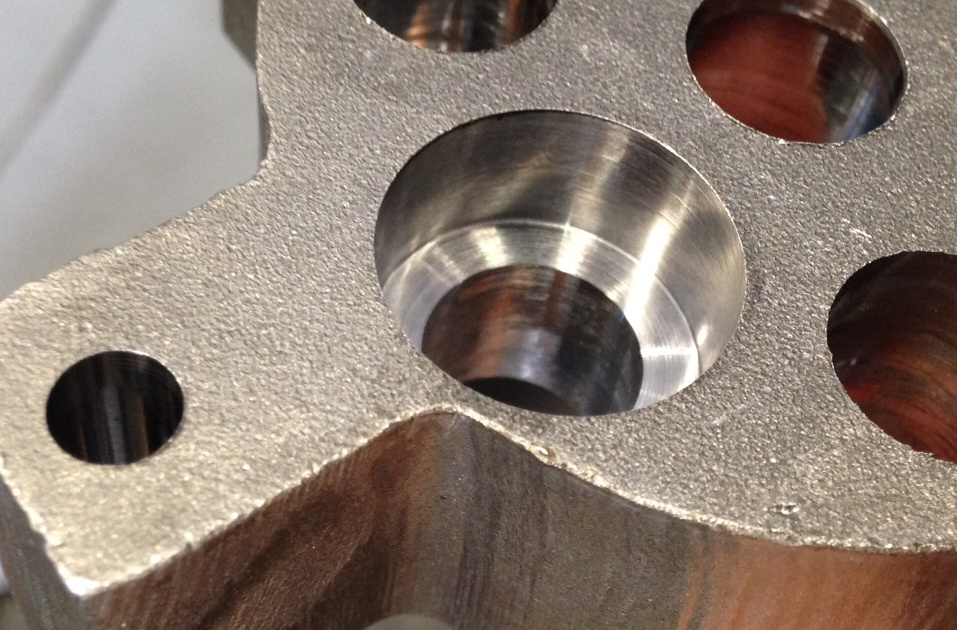 countersinks on a gear component for a tractor