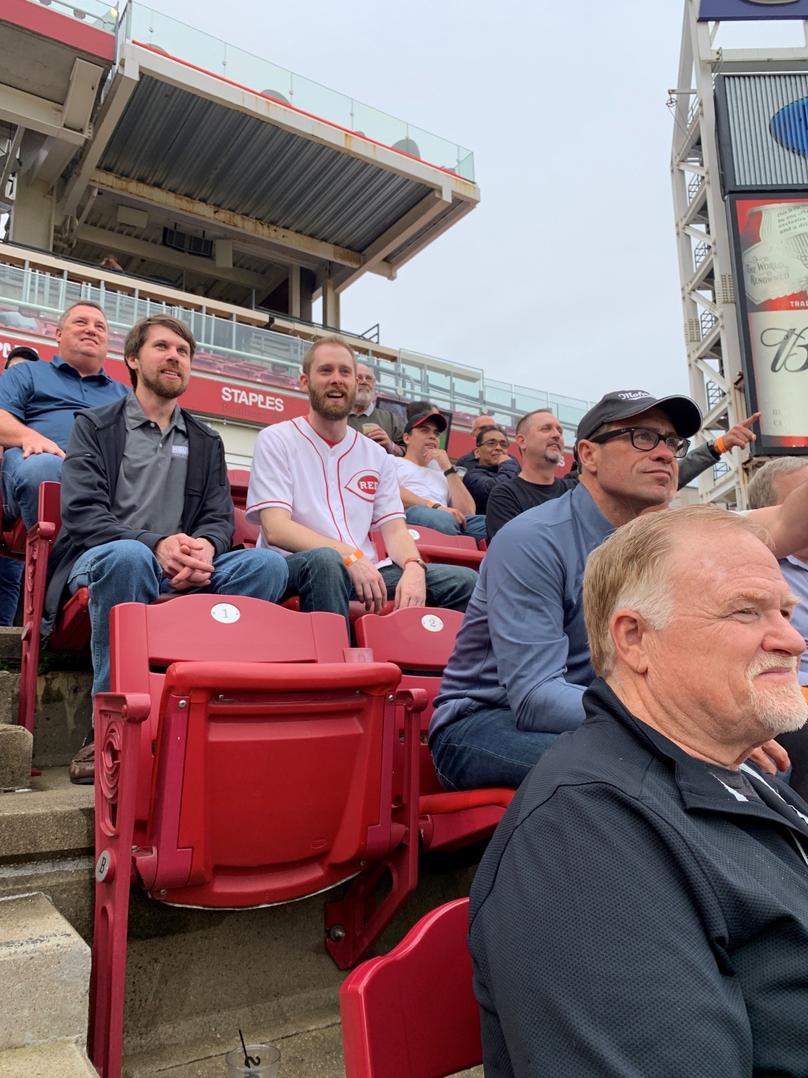 men watching a baseball game
